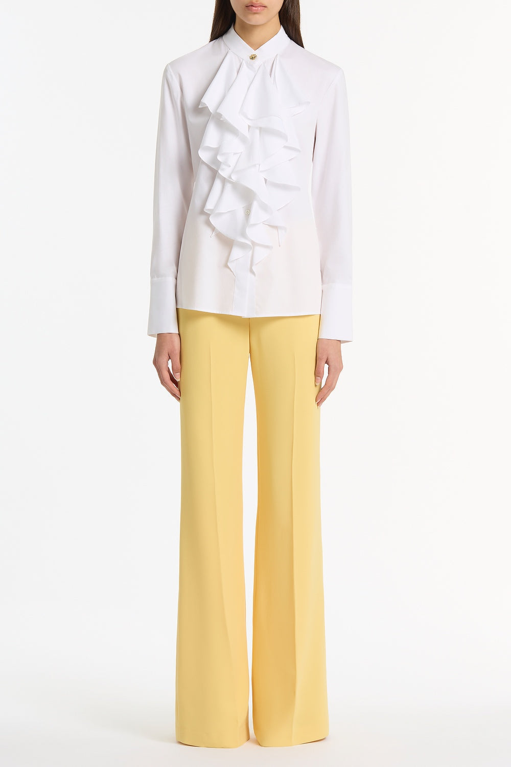 Image of a model wearing Tops. Product name - White Cotton Frill Front Shirt in White colour by brand - Carla Zampatti