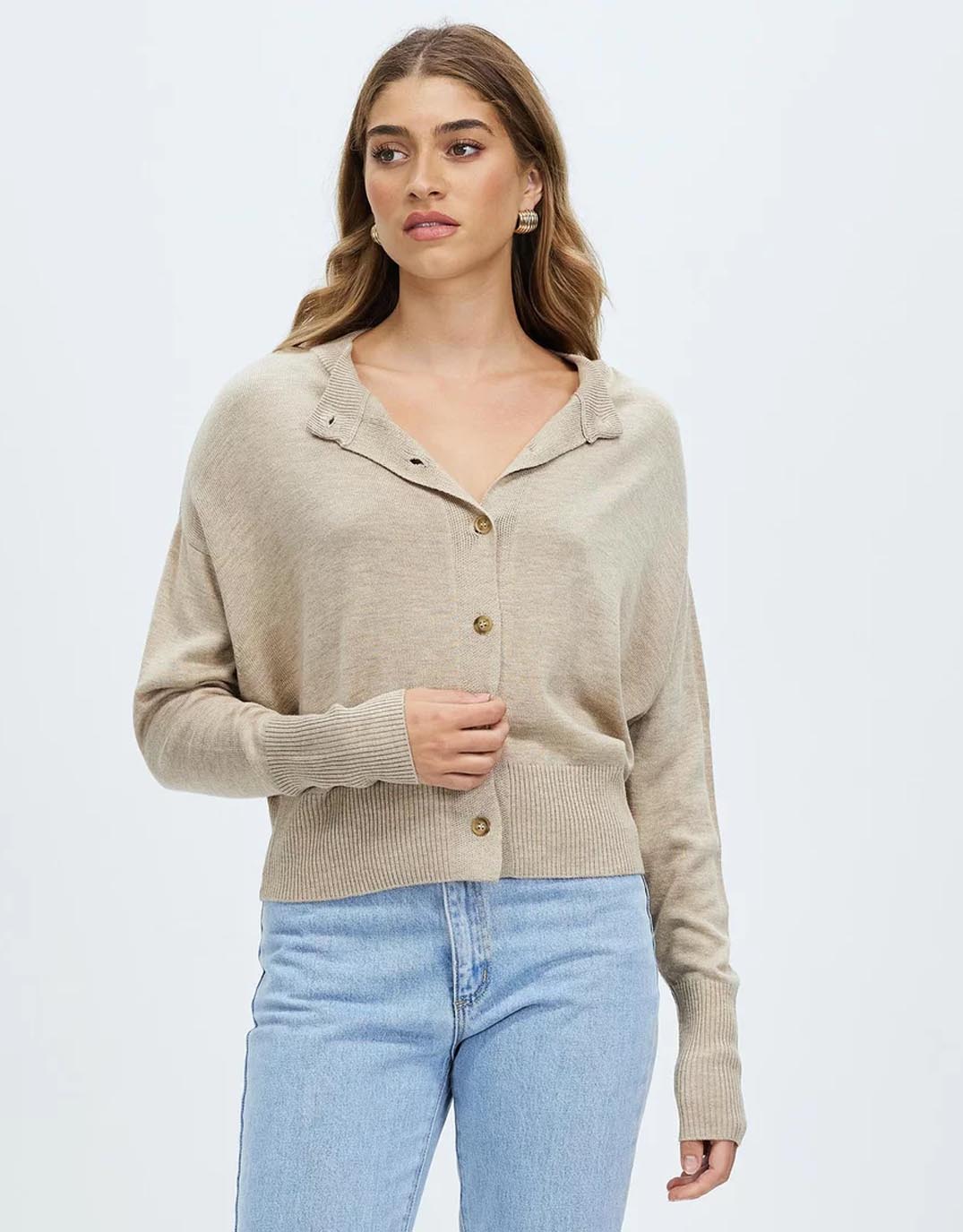 Image of a model wearing Outerwear. Productname: Dacey Cardigan - in Oatmeal colour by brand - White by FTL