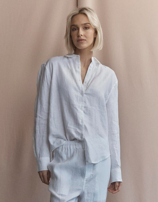 Image of a model wearing Tops. Productname: Katie Linen Shirt - in White colour by brand - White by FTL