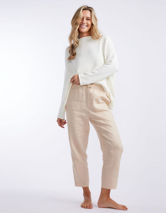 Image of a model wearing Pants. Product name - Abigail Linen Pant Oatmeal in Oatmeal colour by brand - White by FTL