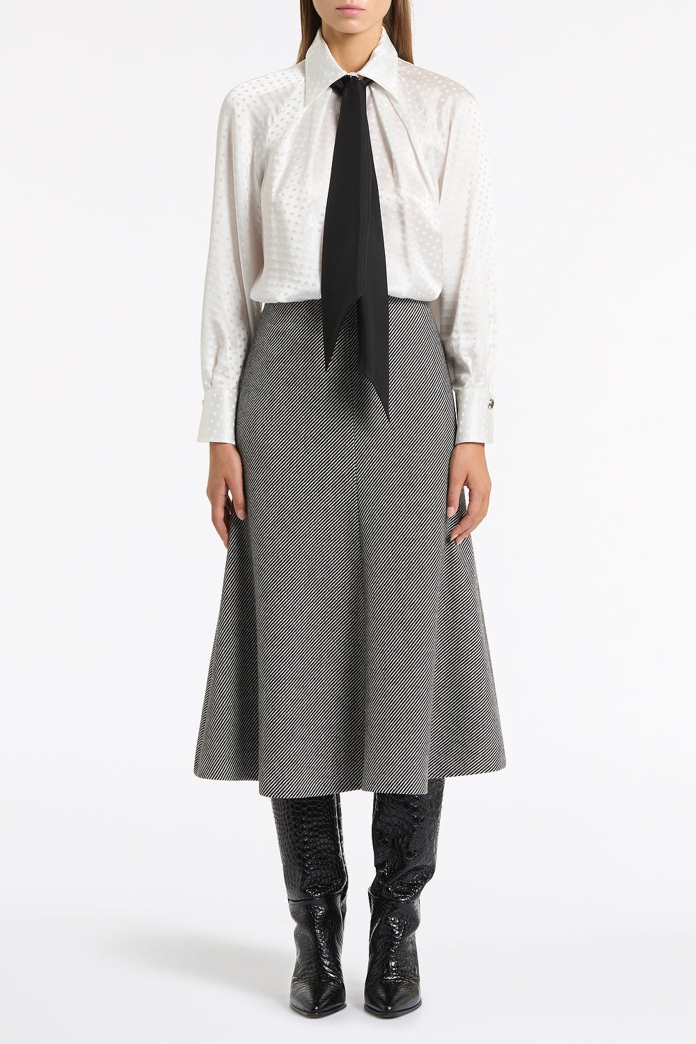 Image of a model wearing Tops. Product name - White Jacquard Spot Contrast Scarf Top in White colour by brand - Carla Zampatti