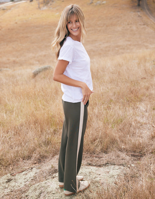 Image of a model wearing Pants. Productname: Timeless Straight Leg Ponte Pant - in Khaki/Natural colour by brand - White & Co.