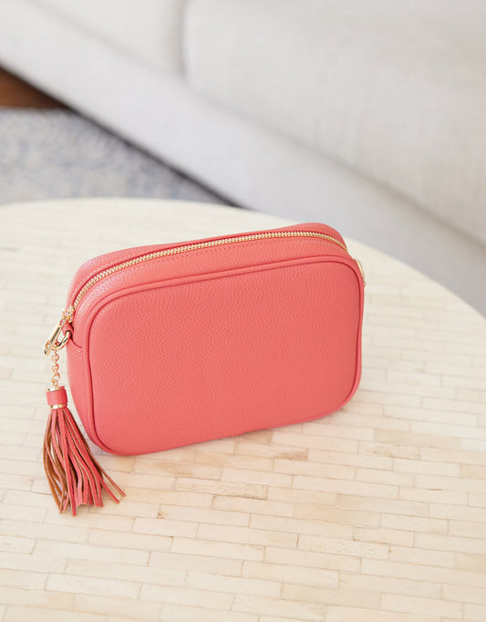 Image of Accessories. Productname: Zoe Classic Crossbody Bag - in Coral colour by brand - White & Co.