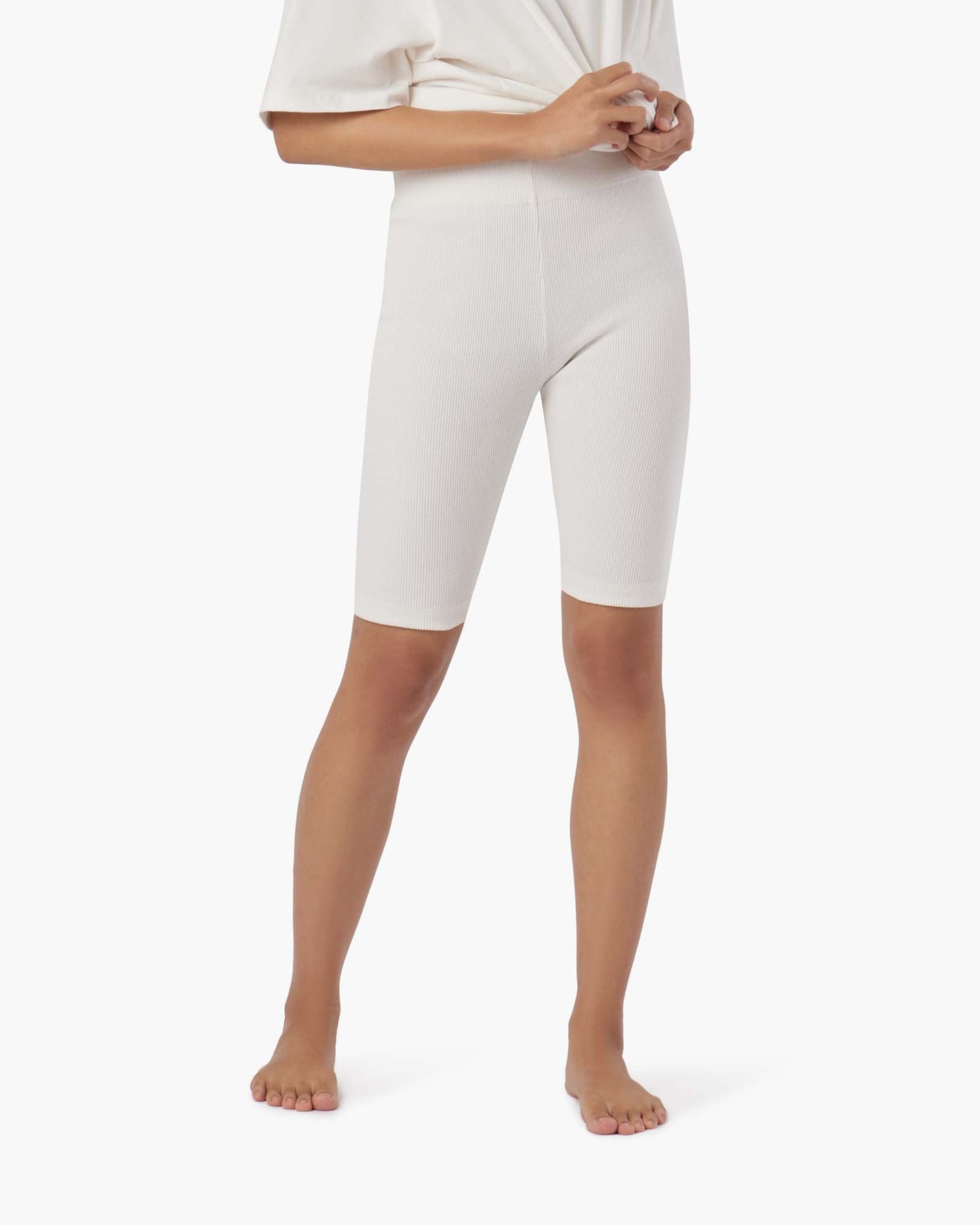 Image of a model wearing Shorts. Productname: Biker Short Cream in Cream colour by brand - TKEES