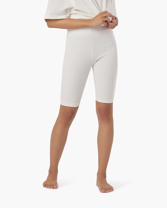Image of a model wearing Shorts. Productname: Biker Short Cream in Cream colour by brand - TKEES
