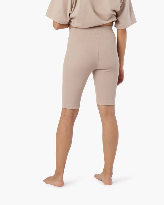 Image of a model wearing Shorts. Productname: Biker Short Sandy Taupe in Sandy Taupe colour by brand - TKEES