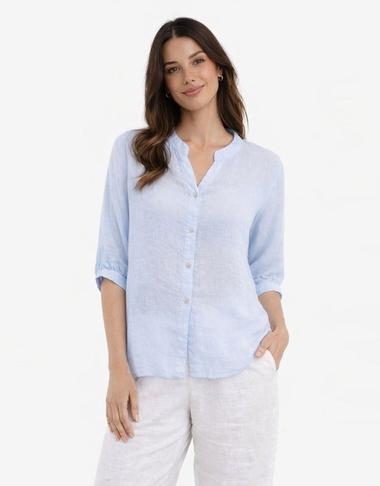 Image of a model wearing Tops. Productname: Allegra Linen Shirt - in Light Blue colour by brand - Worthier The Label