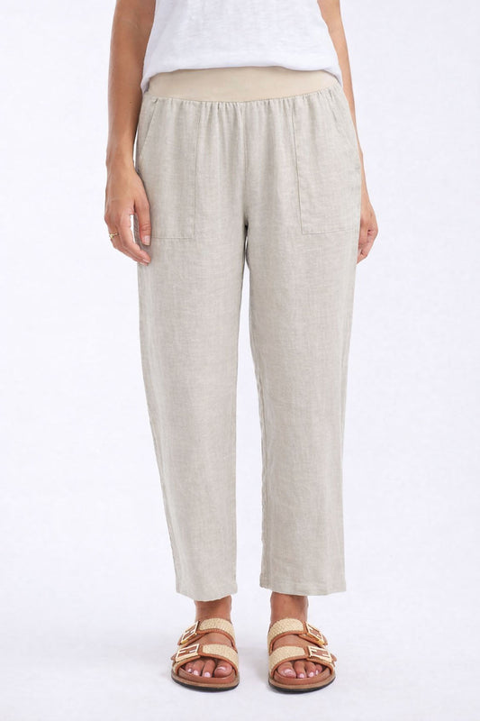 Image of a model wearing Pants. Productname: Sorrento Linen Pants - in Beige colour by brand - Worthier The Label